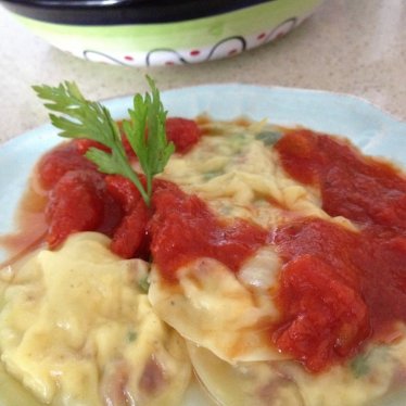 Les raviolis mozarella, tomates séchées et parmesan